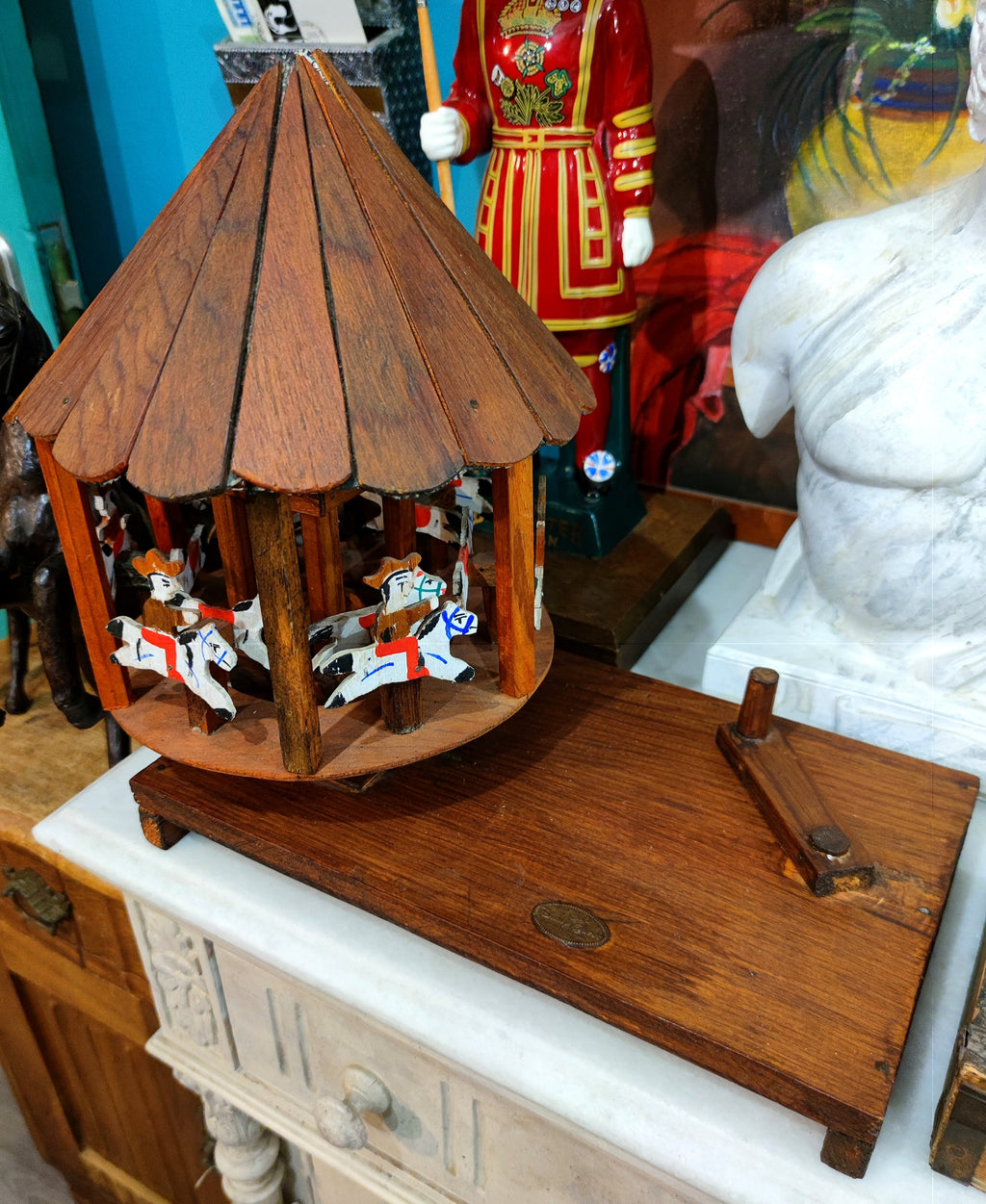Vintage wooden handmade hand turned carousel