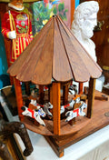 Vintage wooden handmade hand turned carousel