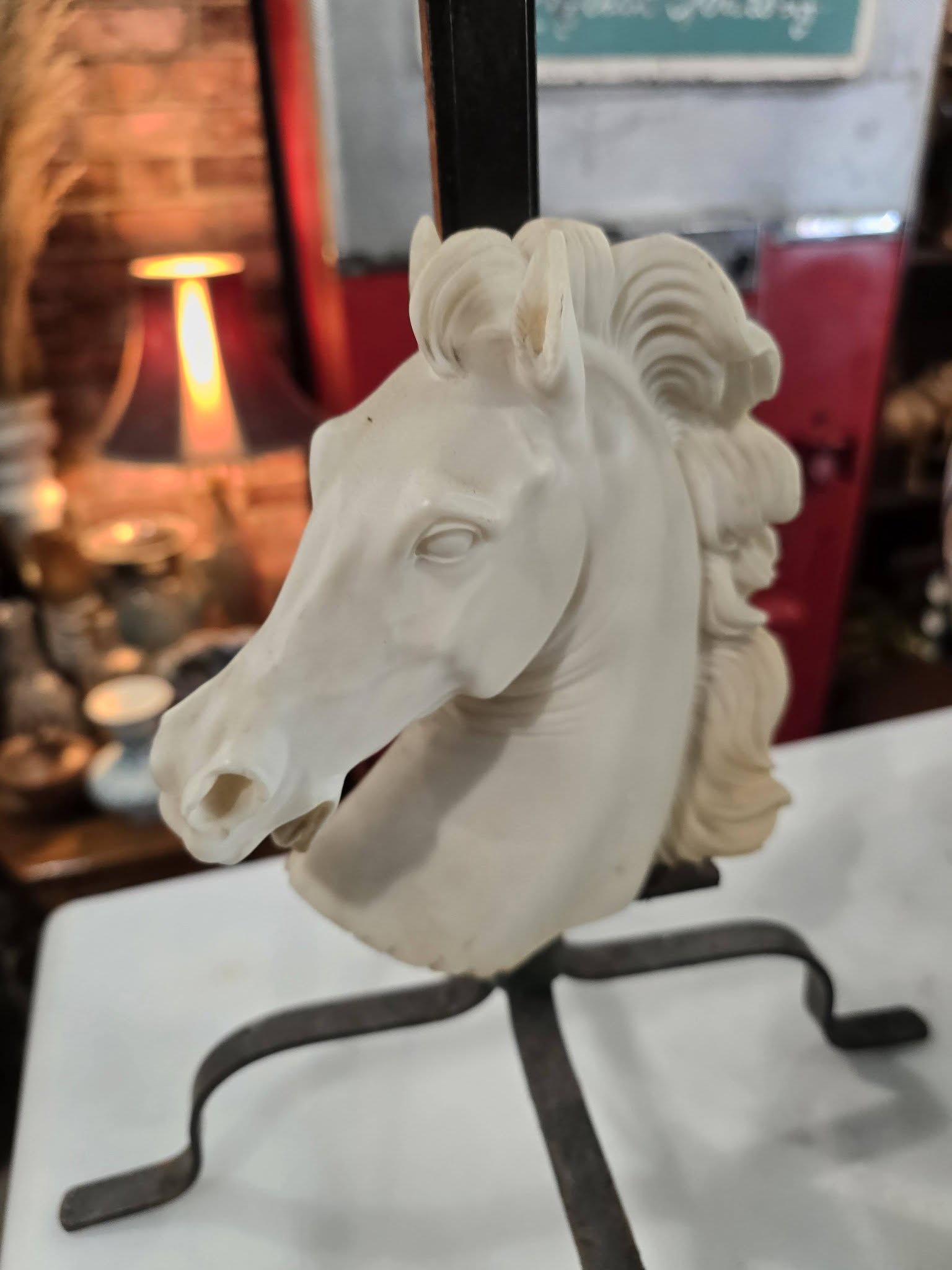 Vintage table lamp blue fabric shade and a white sculpted horse head bust on a black metal base