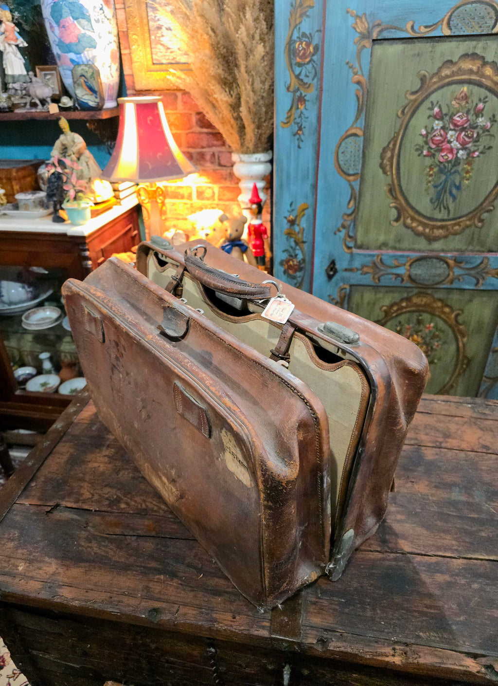 Antique brown leather suitcase bag