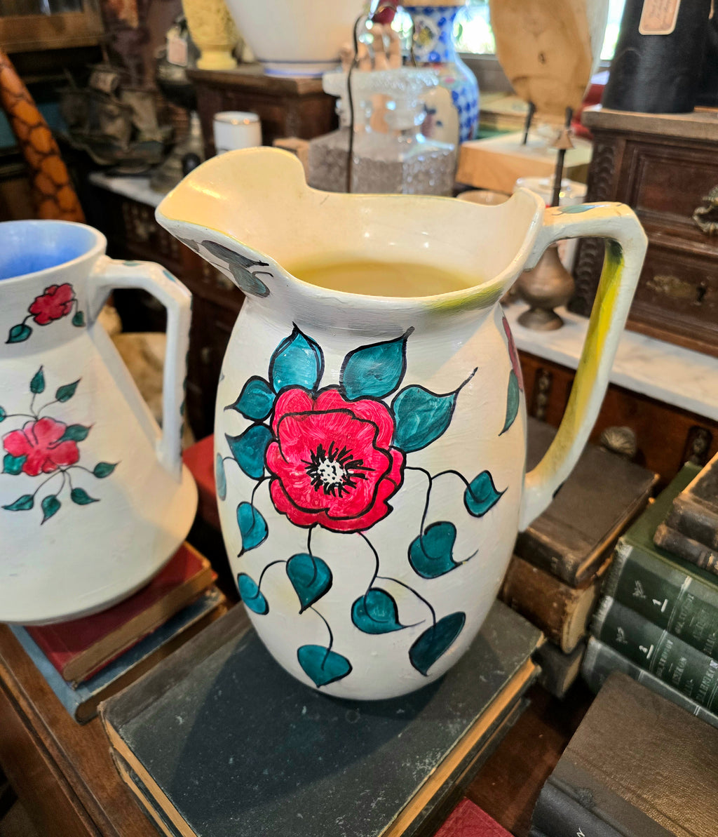 Vintage hand painted ceramic pitchers set