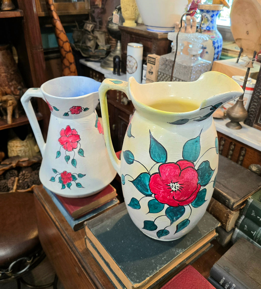 Vintage hand painted ceramic pitchers set