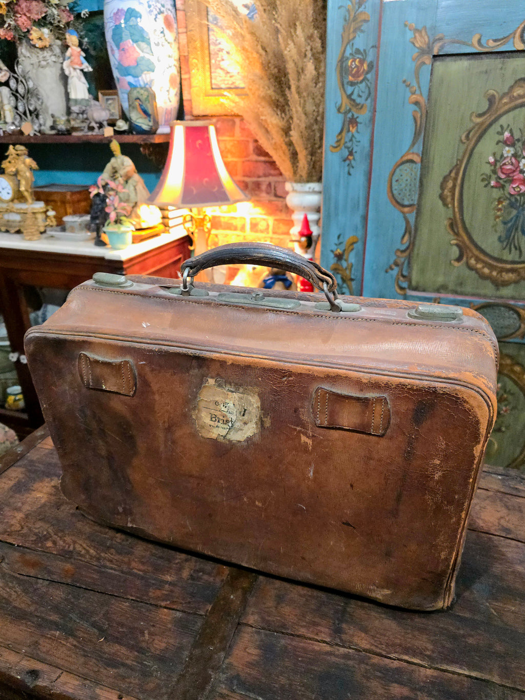 Antique brown leather suitcase bag