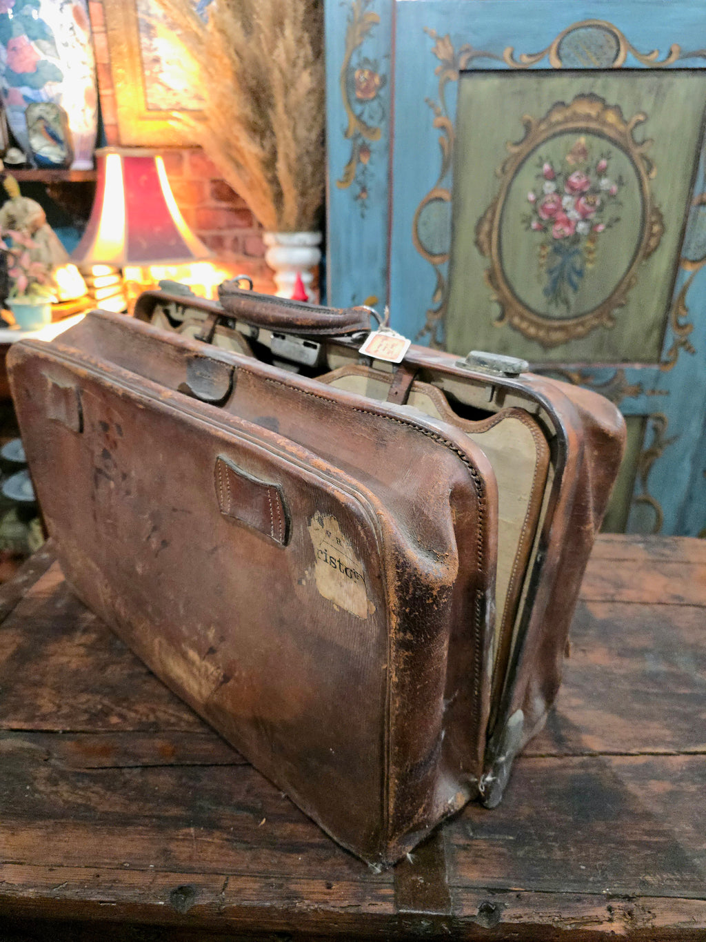 Antique brown leather suitcase bag