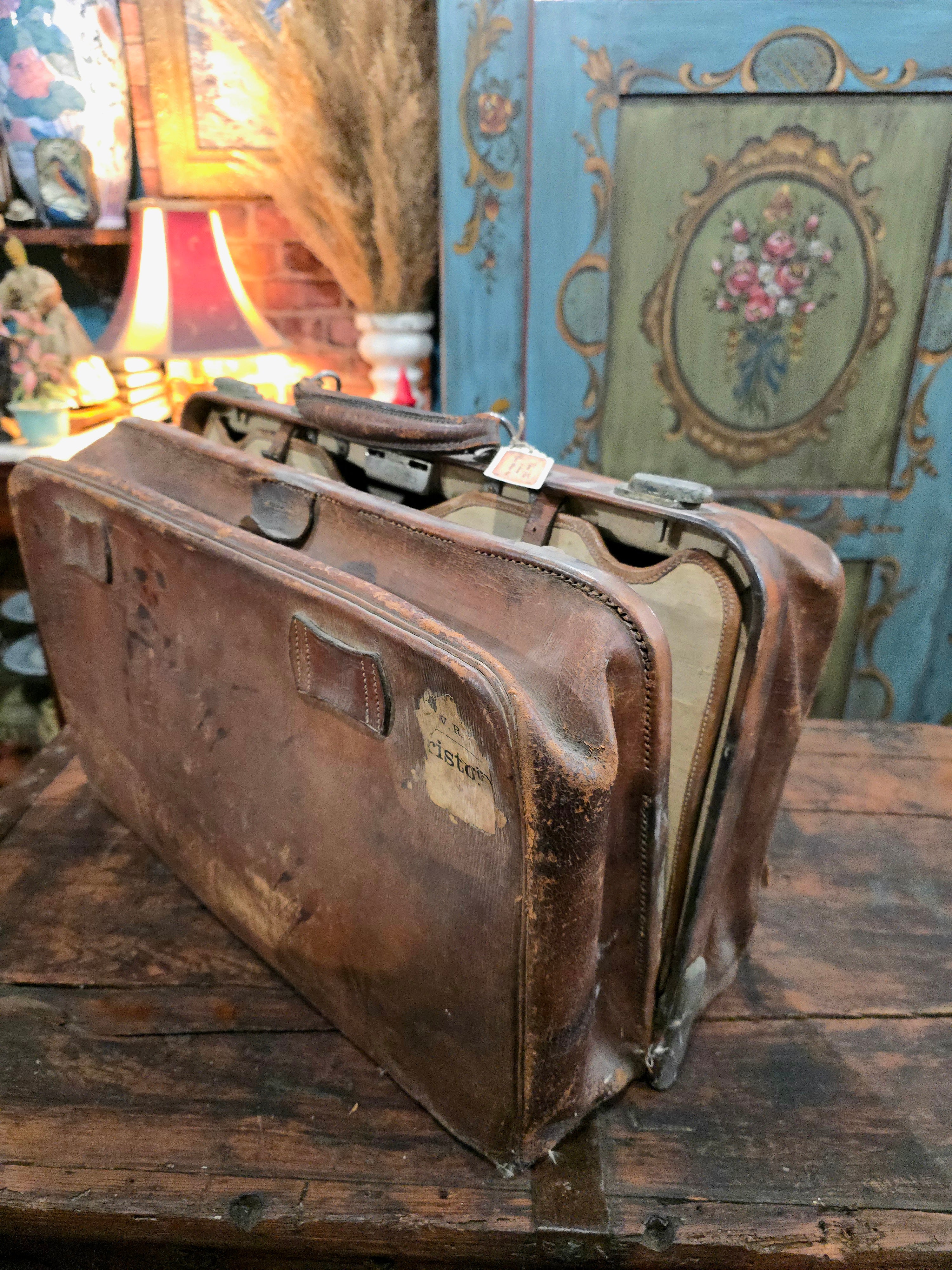 Antique brown leather suitcase bag