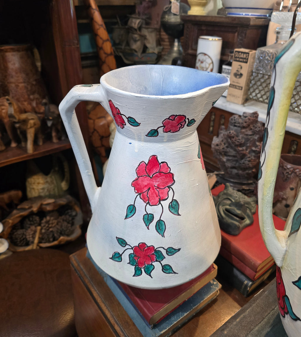 Vintage hand painted ceramic pitchers set
