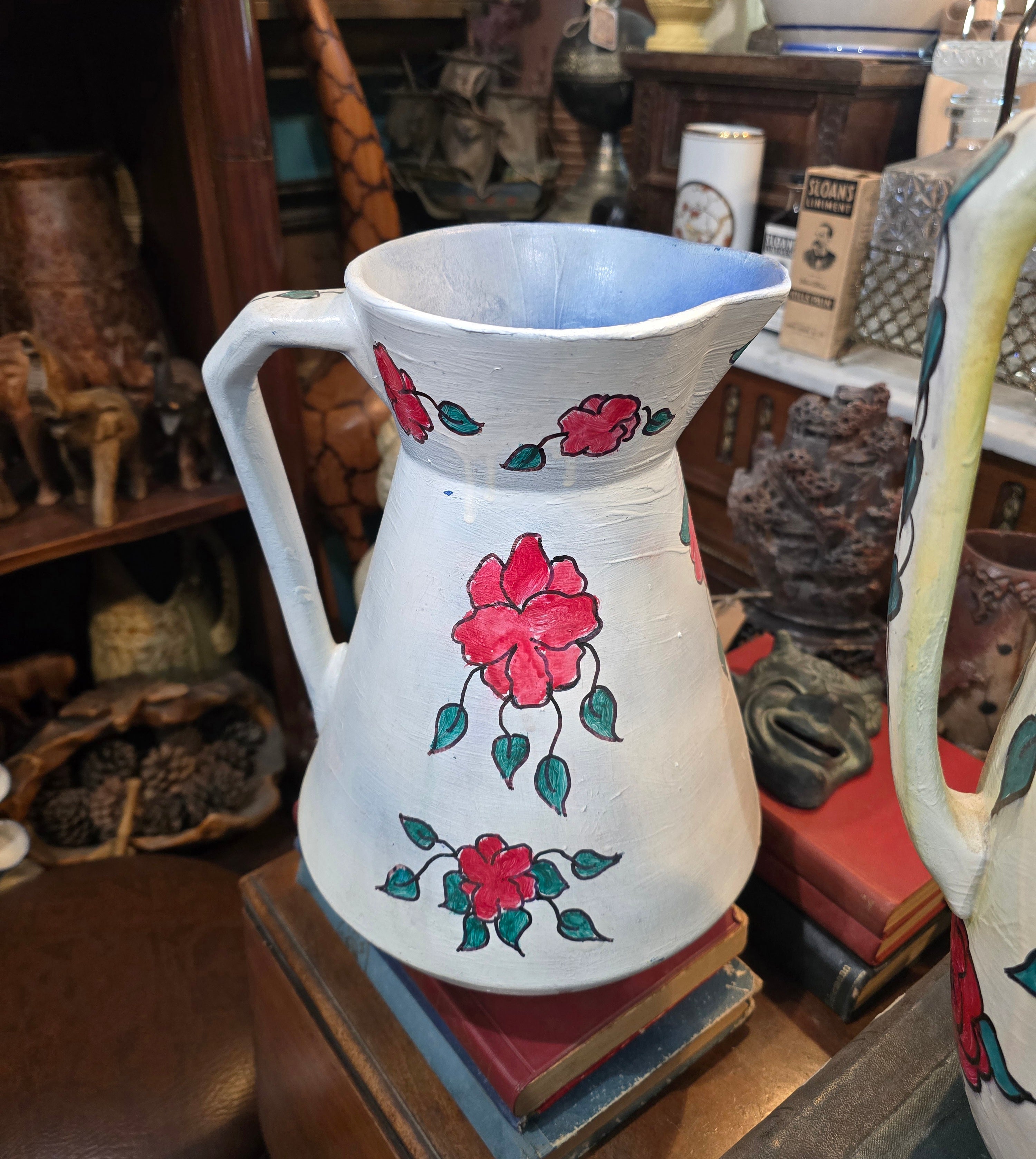 Vintage hand painted ceramic pitchers set