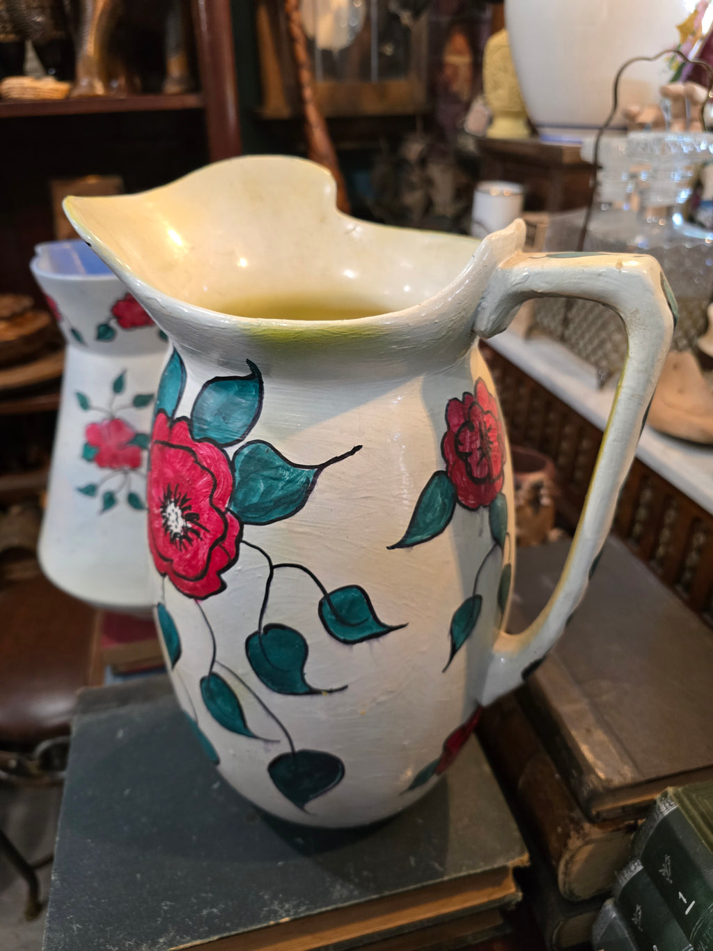 Vintage hand painted ceramic pitchers set